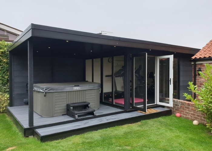 Garden-room-with-hot-tub-canopy-and-inside-gym